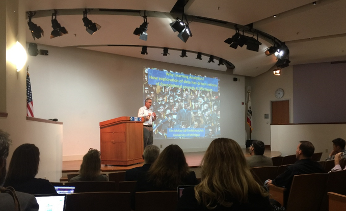 Man at podium speaks at Berkeley Learning Analytics Conference