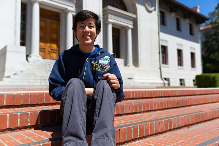 Robotics graduate student Justin Yim led the effort to program Salto with sophisticated control software that lets the robot master complex maneuvers. (UC Berkeley photo by Stephen McNally)