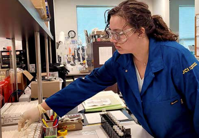 A woman working in a lab. Photo: UCI Research Safety Services