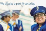 We all play a part in security - photo of woman in hat smiling with two others in background