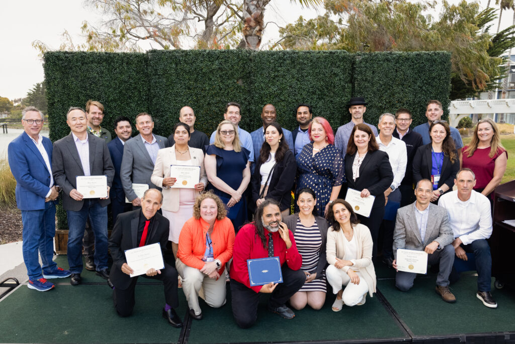 2023 UC Tech Award Winners pose for a group photo with UC CIOs. 